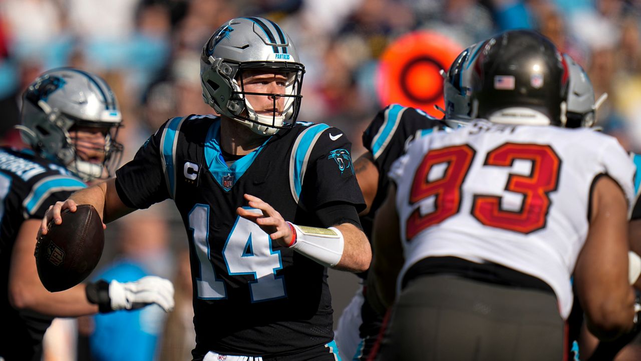 Carolina Panthers quarterback Sam Darnold passes against the Tampa Bay Buccaneers Sunday, Dec. 26, 2021, in Charlotte, N.C. The Panthers' quarterback duo of Darnold and Cam Newton failed to produce in the 32-6 loss.(AP Photo/Rusty Jones)