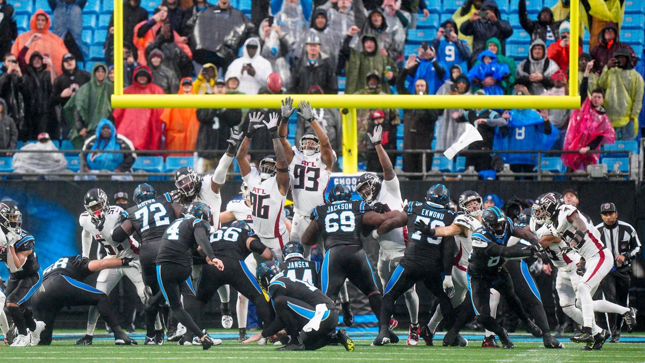 Carolina Panthers place-kicker Eddy Pineiro (4) kicks the game-winning field goal against the Atlanta Falcons during an NFL football game Sunday, Dec. 17, 2023, in Charlotte, N.C. (AP Photo/Jacob Kupferman)