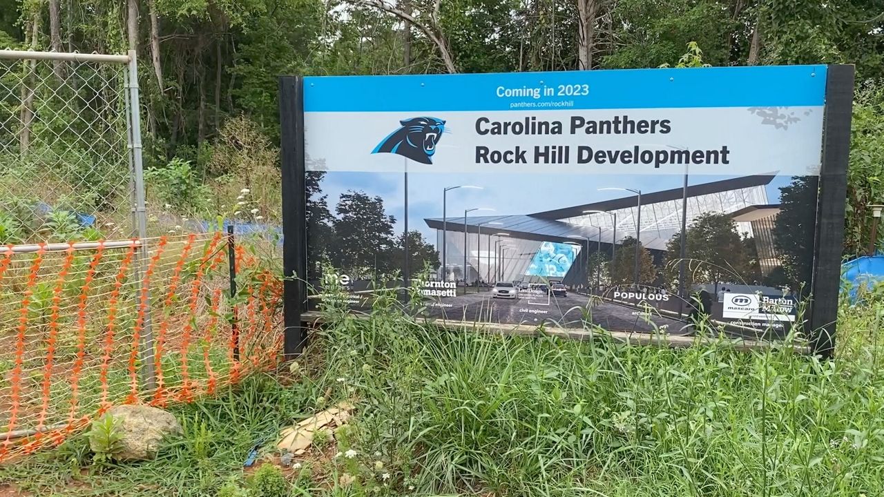 A sign for the now canceled Panthers' Rock Hill project still sits at the entrance to the site