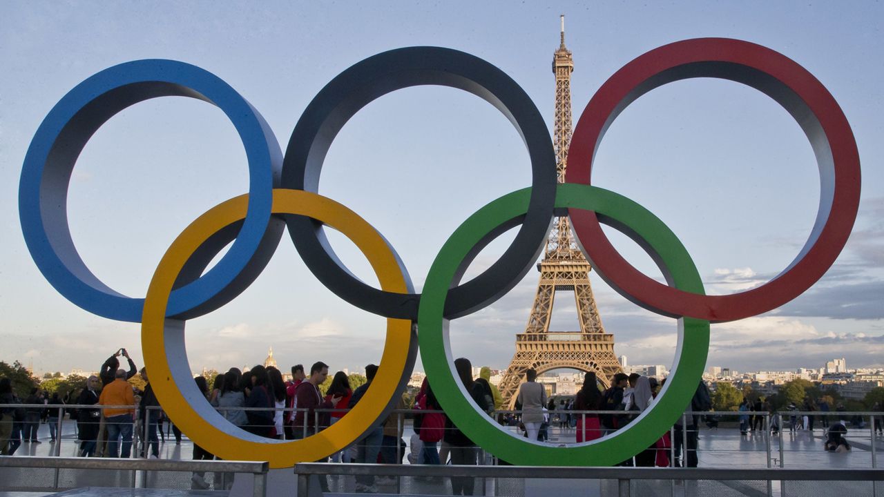 The Olympic rings are set up in Paris, France on Sept. 14, 2017 at Trocadero plaza that overlooks the Eiffel Tower, a day after the official announcement that the 2024 Summer Olympic Games will be in the French capital. (AP Photo/Michel Euler, File)