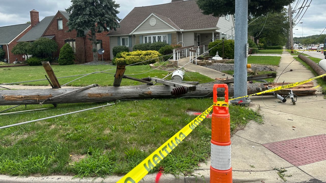 Downed power lines near a home in Parma.