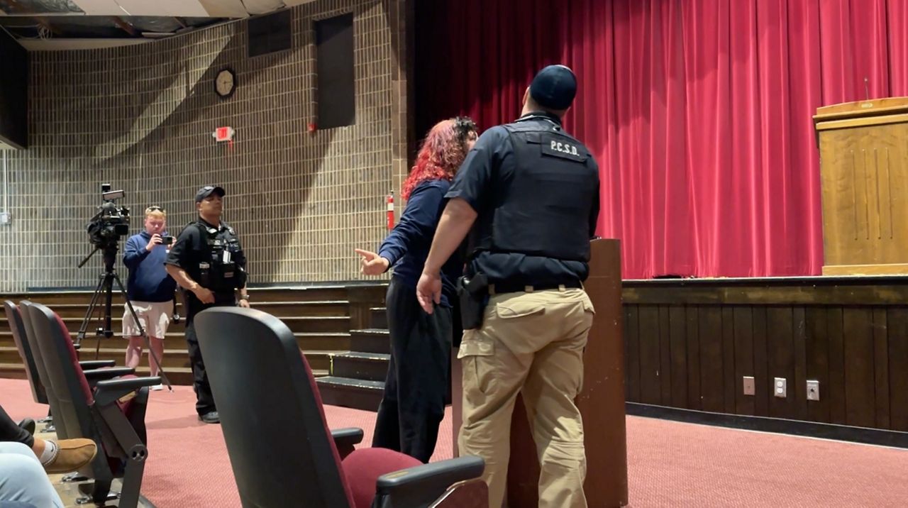Tensions flare at school board meeting after school shooting