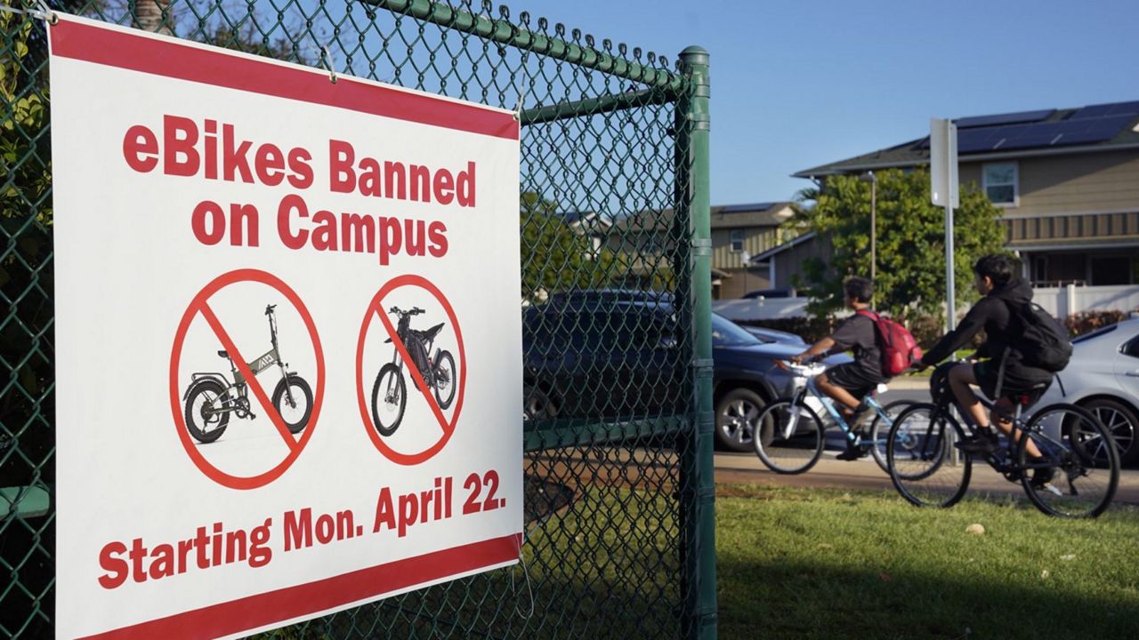 A ban on e-bikes in ʻEwa Beach comes after a collision last year between a 12-year-old riding an e-bike and car. (Honolulu Civil Beat/Kevin Fujii)