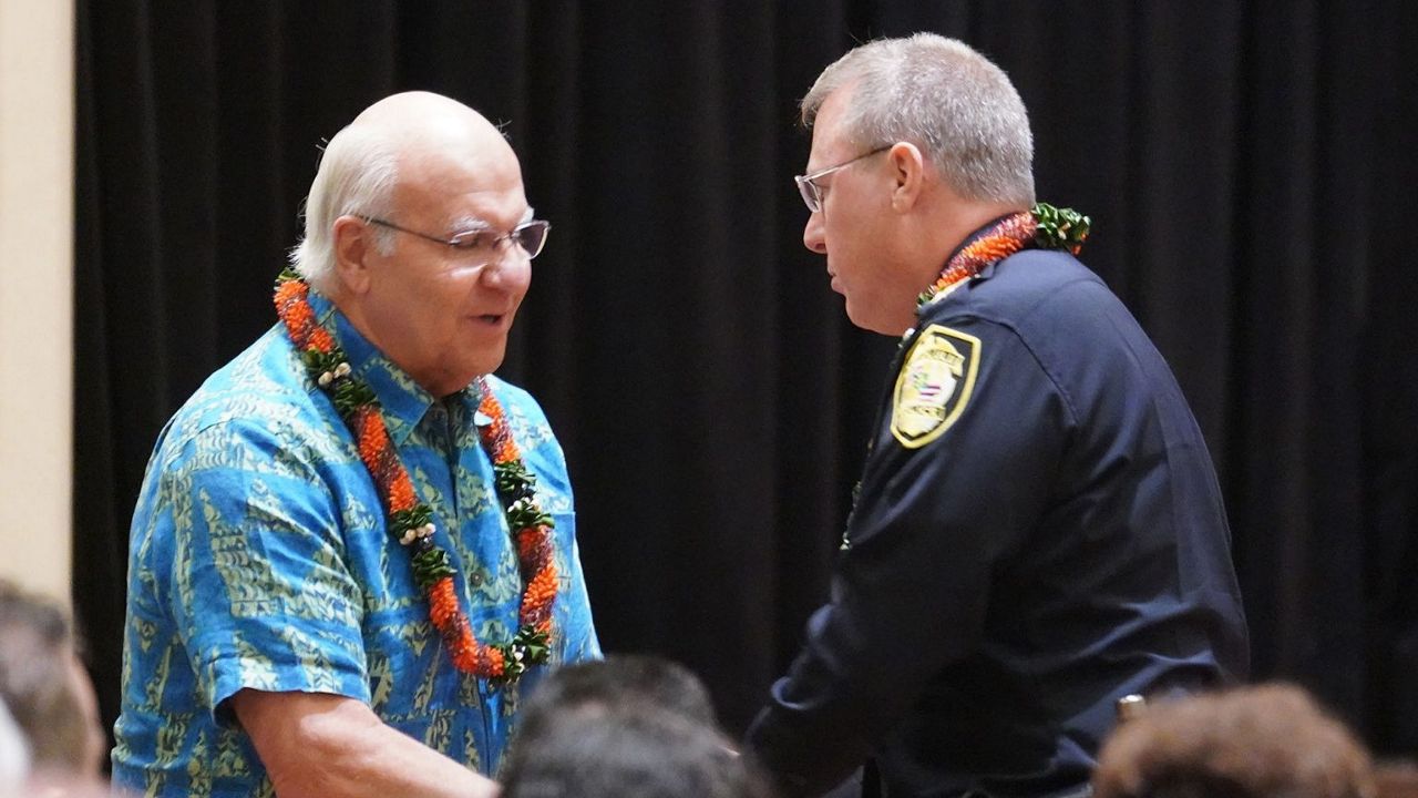 Honolulu Police Chief Joe Logan, right, had a tense relationship with Mayor Rick Blangiardi, left, since he took the top HPD post in 2022. (Honolulu Civil Beat/Cory Lum)