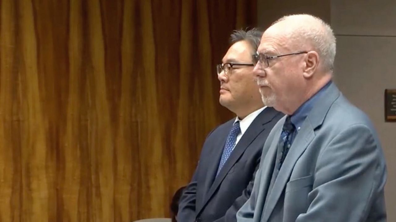 JL Capital CEO Timothy Lee, pictured left with his attorney David Minkin, has pleaded not guilty to the charges. (Hawaii News Now photo via Honolulu Civil Beat)