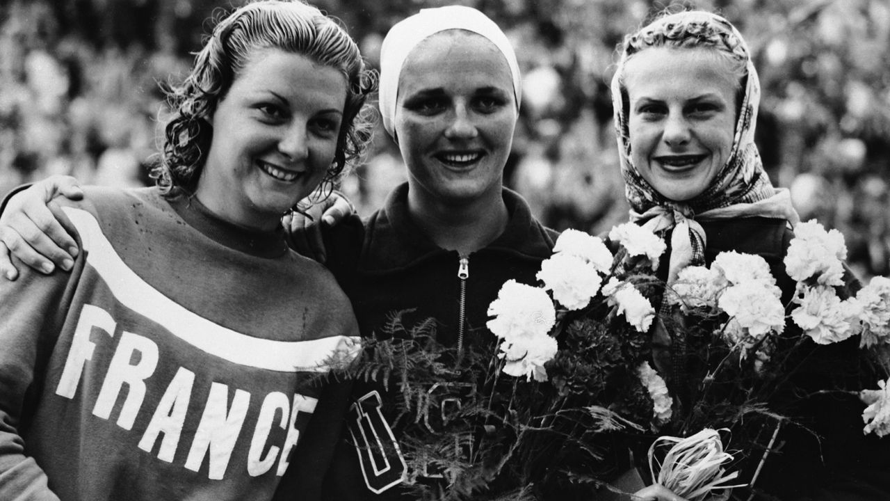 L-R: Madeleine Moreau of France (silver medallist, 139.34 points); Patricia McCormick of USA (gold, 147.30 points); and America's Zoe Jensen (bronze, 127.57 points) after the Women's 3 Meter Springboard Diving event at the Summer Olympics Games in Helsinki, Finland on July 30, 1952. (AP Photo)