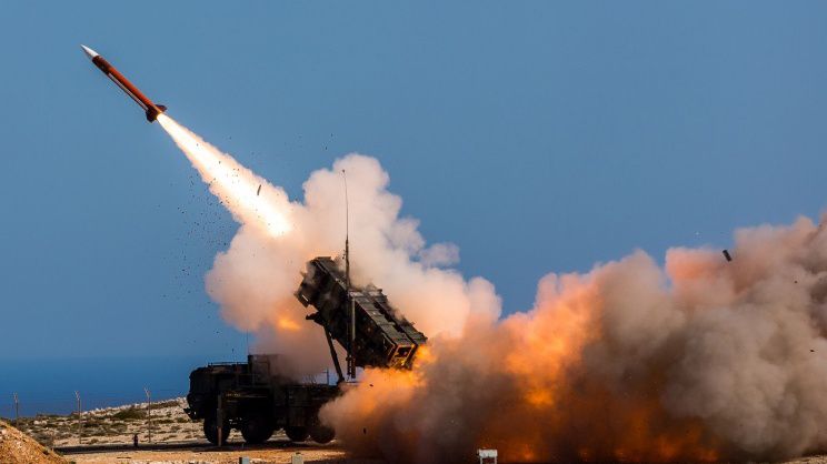 In this image released by the U.S. Department of Defense, German soldiers assigned to Surface Air and Missile Defense Wing 1, fire the Patriot weapons system at the NATO Missile Firing Installation, in Chania, Greece, on Nov. 8, 2017.  (Sebastian Apel/U.S. Department of Defense, via AP, File)