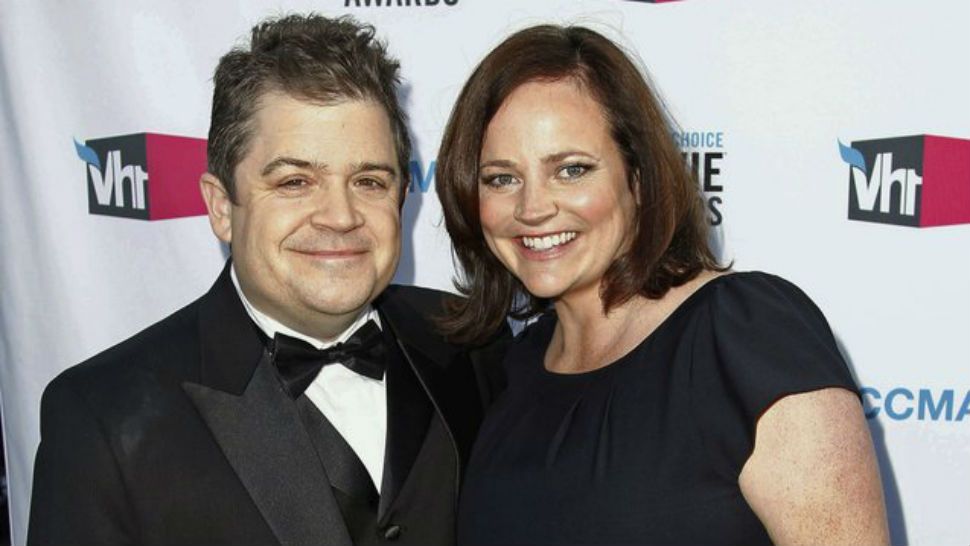 FILE - In this Jan. 12, 2012 file photo, comedian Patton Oswalt, left, and his wife Michelle McNamara arrive at the 17th annual Critics’ Choice Movie Awards in Los Angeles. Patton Oswalt is crediting his late wife for her work in pursuit of the so-called Golden State Killer. Michelle McNamara had made it her mission to find the person responsible for at least 12 murders and 50 rapes throughout California in the 1970s and 80s. She died in April 2016. On Wednesday, April 25, 2018, authorities said a DNA match led them to arrest Joseph James DeAngelo, a 72-year-old former police officer, as a suspect. (AP Photo/Matt Sayles, File)
