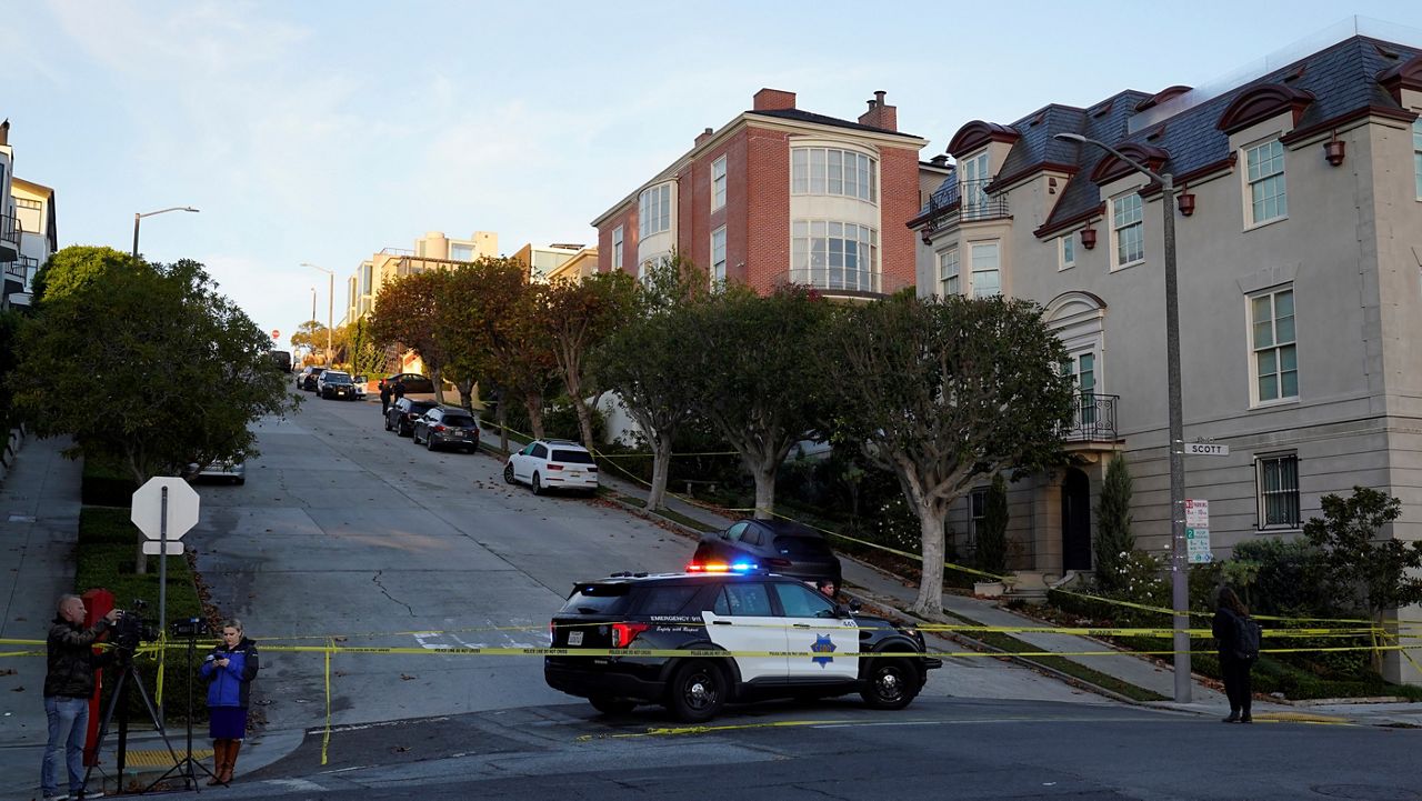 Police tape blocks a street outside the home of House Speaker Nancy Pelosi and her husband Paul Pelosi in San Francisco, Friday, Oct. 28, 2022. Paul Pelosi, was attacked and severely beaten by an assailant with a hammer who broke into their San Francisco home early Friday, according to people familiar with the investigation. (AP Photo/Eric Risberg)