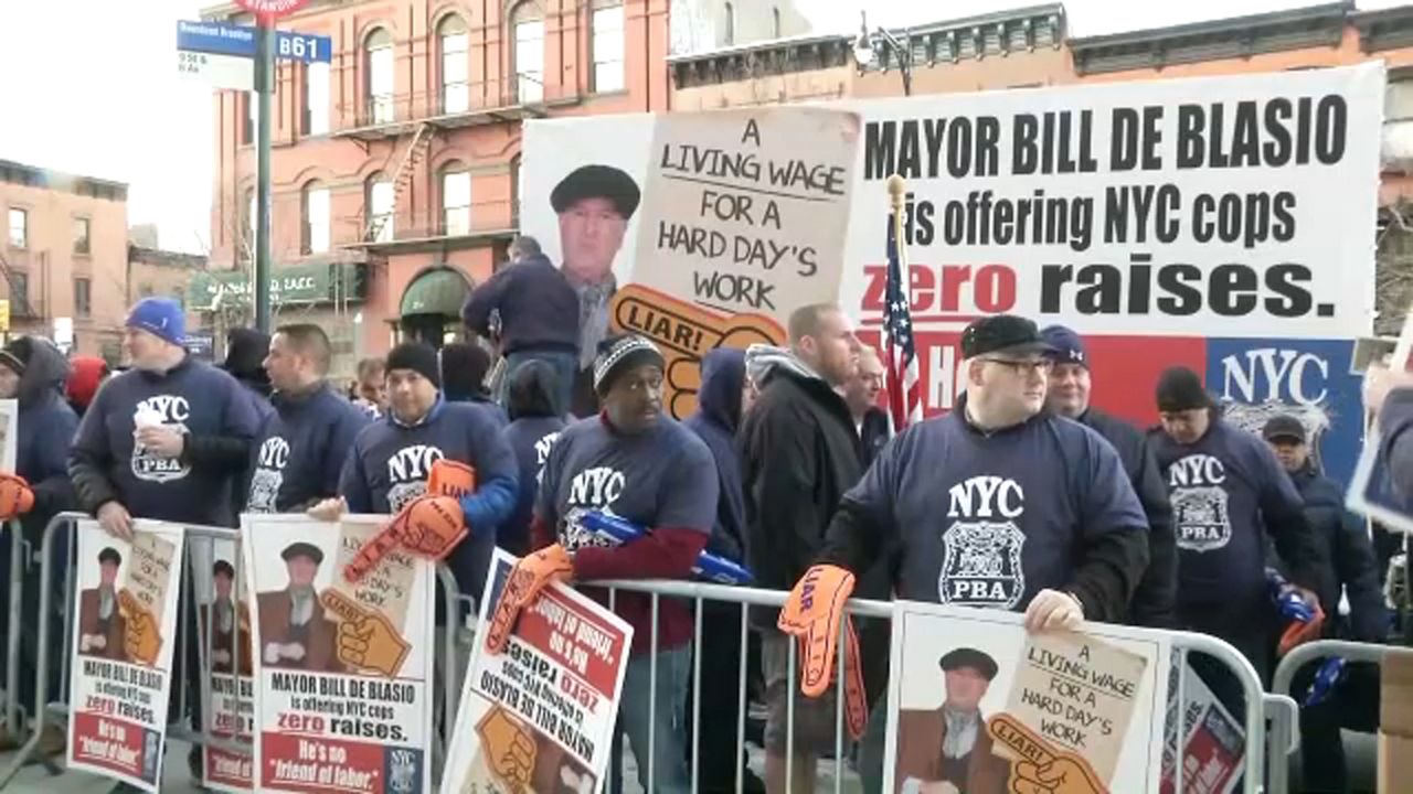 Police officers and their supporters gathered outside the mayor's gym in Park Slope for a rally organized by the Patrolmen's Benevolent Association.