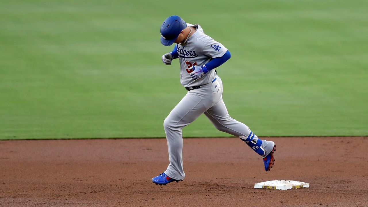 Los Angeles Dodgers' Joc Pederson runs the bases after hitting a two-run home run during the second inning of a baseball game against the San Diego Padres, Wednesday, Aug. 5, 2020, in San Diego. (AP Photo/Gregory Bull)