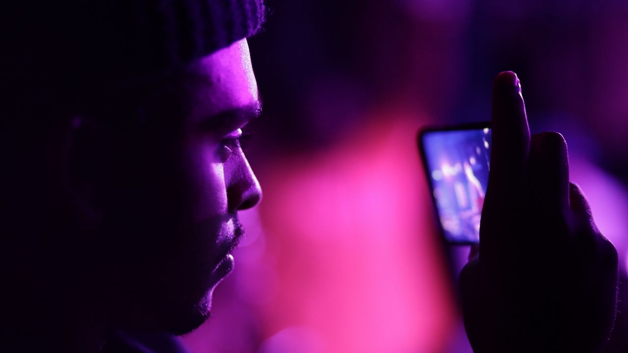 People watch a breaking competition hosted by Supreme Beingz at the Mercury Lounge, June 7, 2019, in New York. (AP Photo/Frank Franklin II, File)