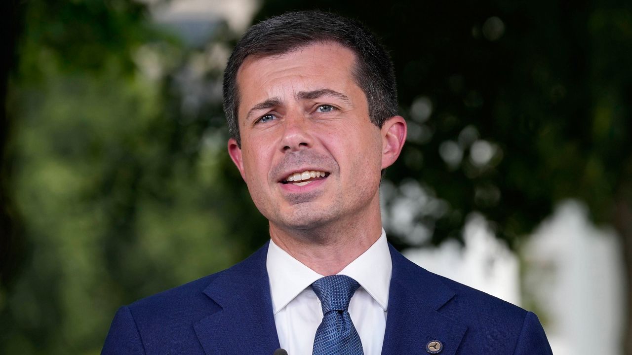 Transportation Secretary Pete Buttigieg talks with reporters at the White House in Washington, July 23, 2024. (AP Photo/Susan Walsh, FIle)