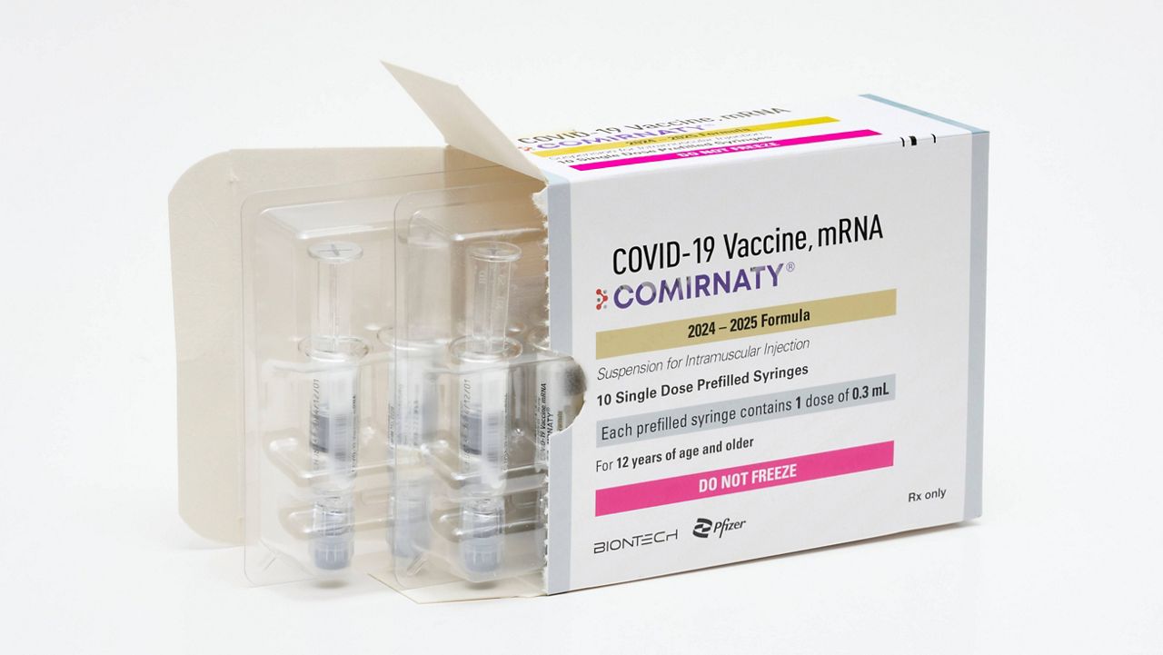 This photo provided by Pfizer in August 2024 shows a packaging for the company's updated COVID vaccine for ages 12 and up, approved by the U.S. Food and Drug Administration on Thursday, Aug. 22, 2024. (Steven Decroos/Pfizer via AP)