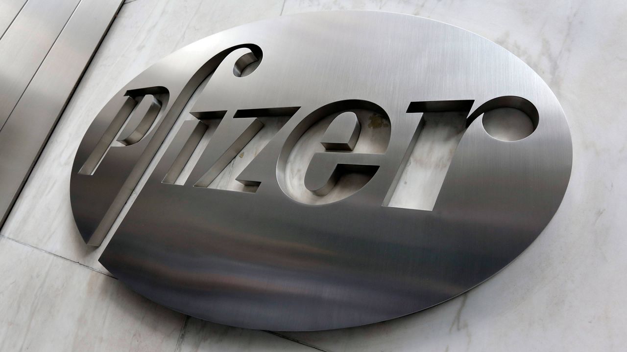 The Pfizer company logo is seen at the company's headquarters in New York. (AP Photo/Richard Drew, File)