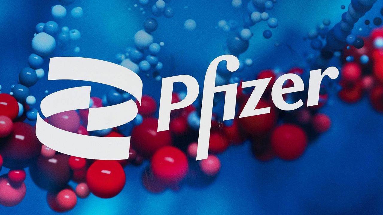 The Pfizer logo is displayed at the company's headquarters in New York, on Feb. 5, 2021. (AP Photo/Mark Lennihan, File)