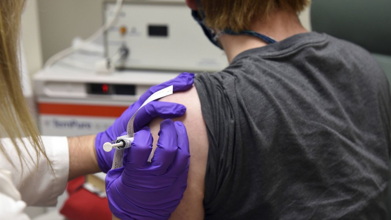 This May 4, 2020, file photo provided by the University of Maryland School of Medicine shows the first patient enrolled in Pfizer's COVID-19 coronavirus vaccine clinical trial there. (Courtesy of University of Maryland School of Medicine via AP, File)