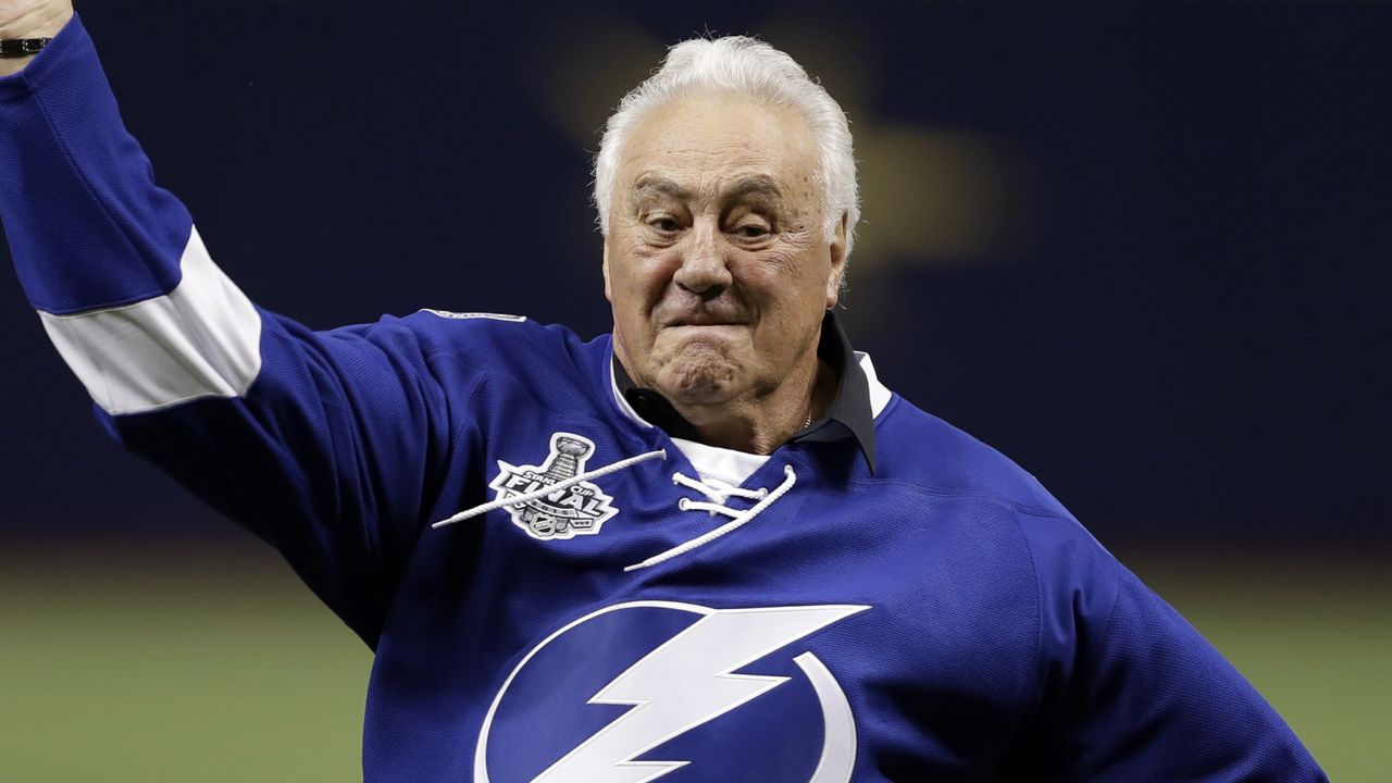 NHL Hall of Famer Phil Esposito throws out the ceremonial first pitch before a baseball game between the Tampa Bay Rays and the Boston Red Sox Friday, March 30, 2018, in St. Petersburg, Fla. (AP Photo/Chris O'Meara)