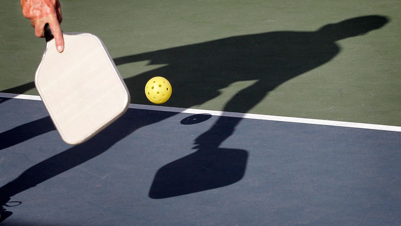 Del Teter competes in a game of pickleball in Arizona on Monday, Dec. 3, 2012.