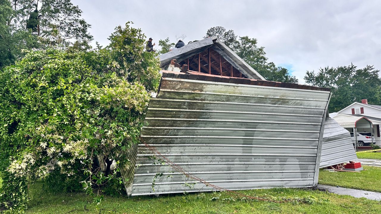 An EF1 tornado in Pinetops early Tuesday morning damaged buildings and knocked down trees and powerlines. (Spectrum News 1/Patrick Thomas)