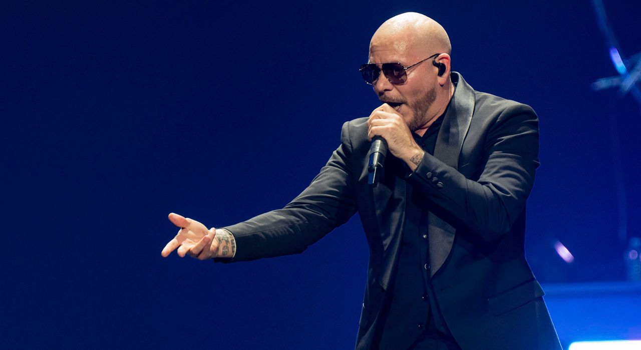 Pitbull performs as part of "The Trilogy Tour" on Sunday, March 3, 2024, in Atlanta. (Photo by Paul R. Giunta/Invision/AP)