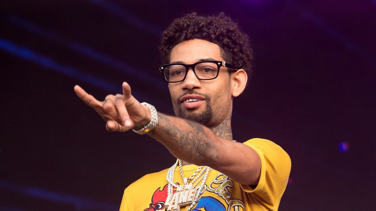 Philadelphia rapper PnB Rock performs at the 2018 Firefly Music Festival in Dover, Del., on June 16, 2018.  (Photo by Owen Sweeney/Invision/AP, File)