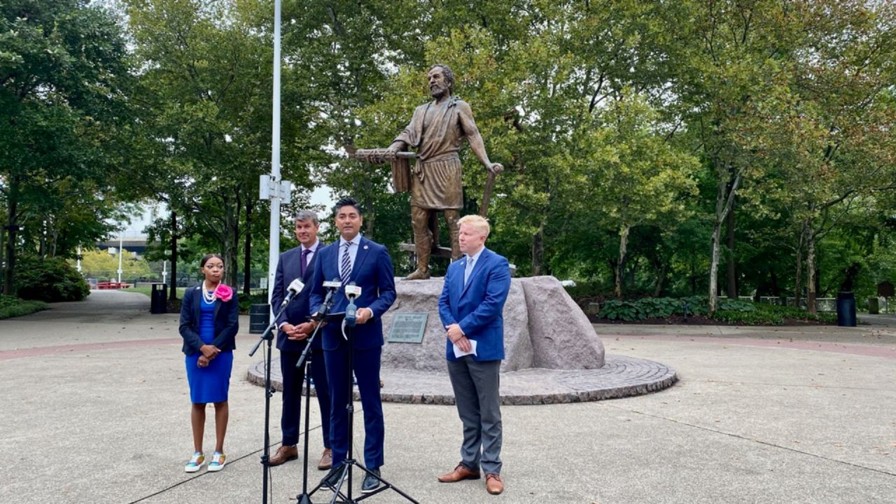 Mayor Aftab Pureval surrounded by three Cincinnati City Council members to outline a proposal to end the mayor's pocket veto power. (Casey Weldon/Spectrum News 1)