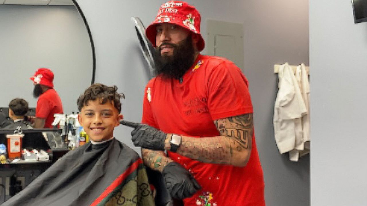 Poughkeepsie barber helps families through haircuts