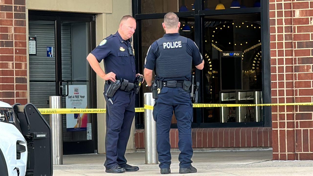 Winston-Salem police officers investigate a shooting that wounded one at Hanes Mall off Interstate 40 on Wednesday afternoon. (Spectrum News 1/Sydney McCoy)