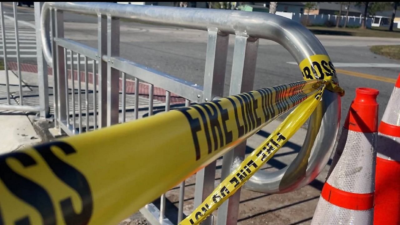 Crime scene tape blocks off the scene of a deadly crash in Kissimmee. (Spectrum News/Celeste Springer)