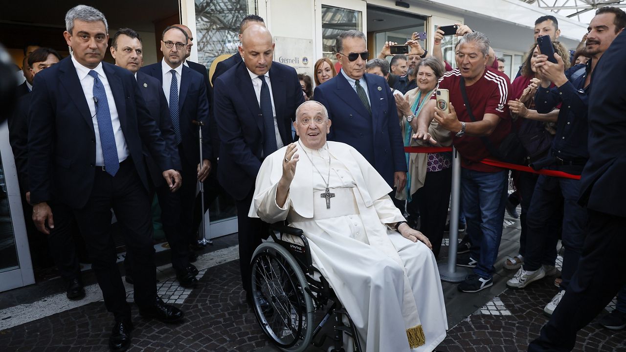 Pope Francis leaves the Agostino Gemelli University Polyclinic in Rome on Friday. (Cecilia Fabiano/LaPresse via AP)