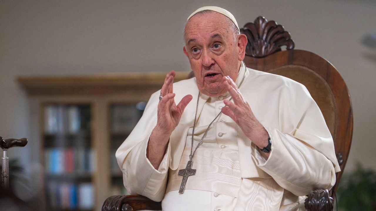 Pope Francis speaks Tuesday an interview with The Associated Press at the Vatican. (AP Photo/Domenico Stinellis)