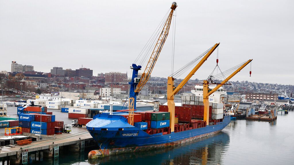 An Icelandic cargo ship is loaded with containers in Portland in 2016. (AP Photo/Robert F. Bukaty)