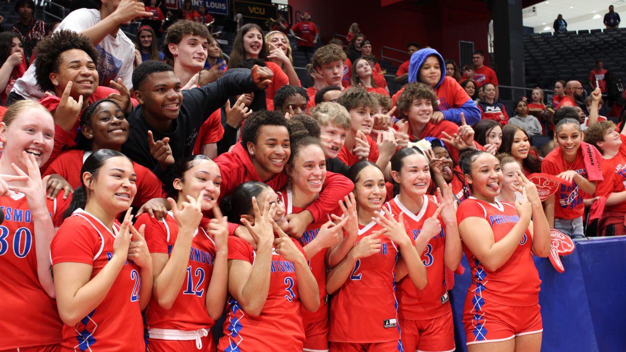 The Portsmouth High School girls basketball team celebrates with the student section after the OHSAA Girls State Championship at UD Arena on Saturday.