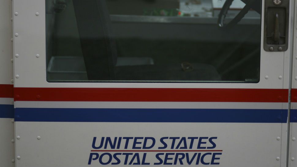 FILE - Closeup photo of USPS mail truck. Image/Kerry Lannert, Flickr