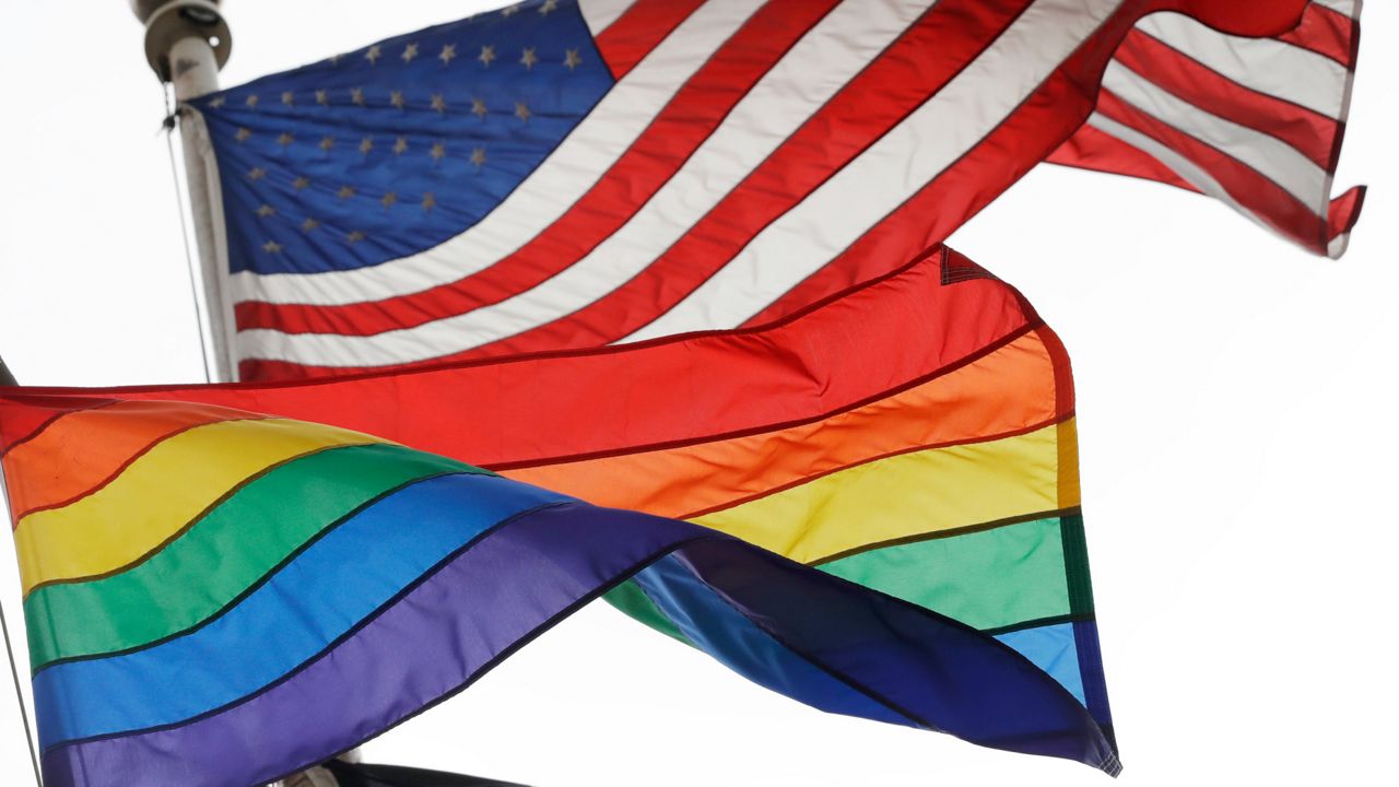 Pride flag and American flag