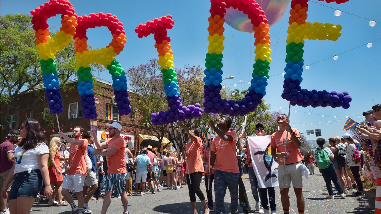 FILE - This June 9, 2019 file photo shows participants in the 49th annual Los Angeles Pride Parade in West Hollywood, Calif. (AP Photo/Richard Vogel, File)