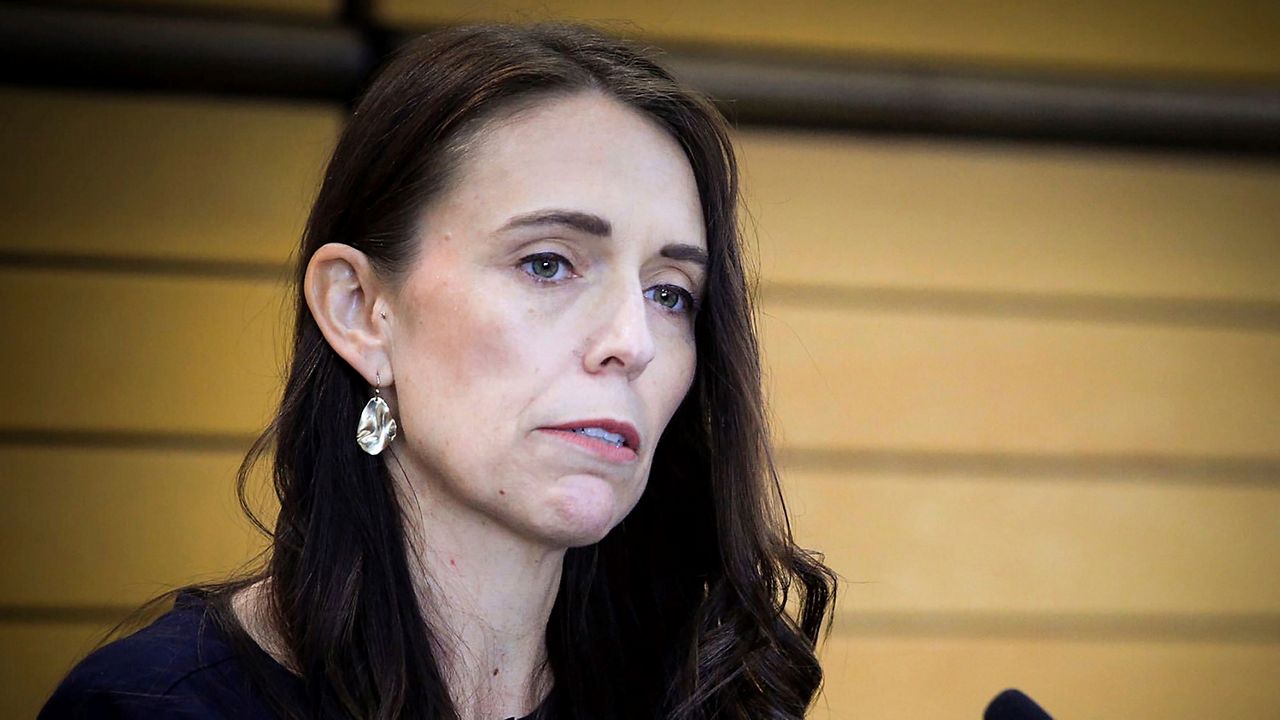 New Zealand Prime Minister Jacinda Ardern grimaces as she announces her resignation at a press conference in Napier, New Zealand Thursday, Jan. 19, 2023. (Warren Buckland/New Zealand Herald via AP)