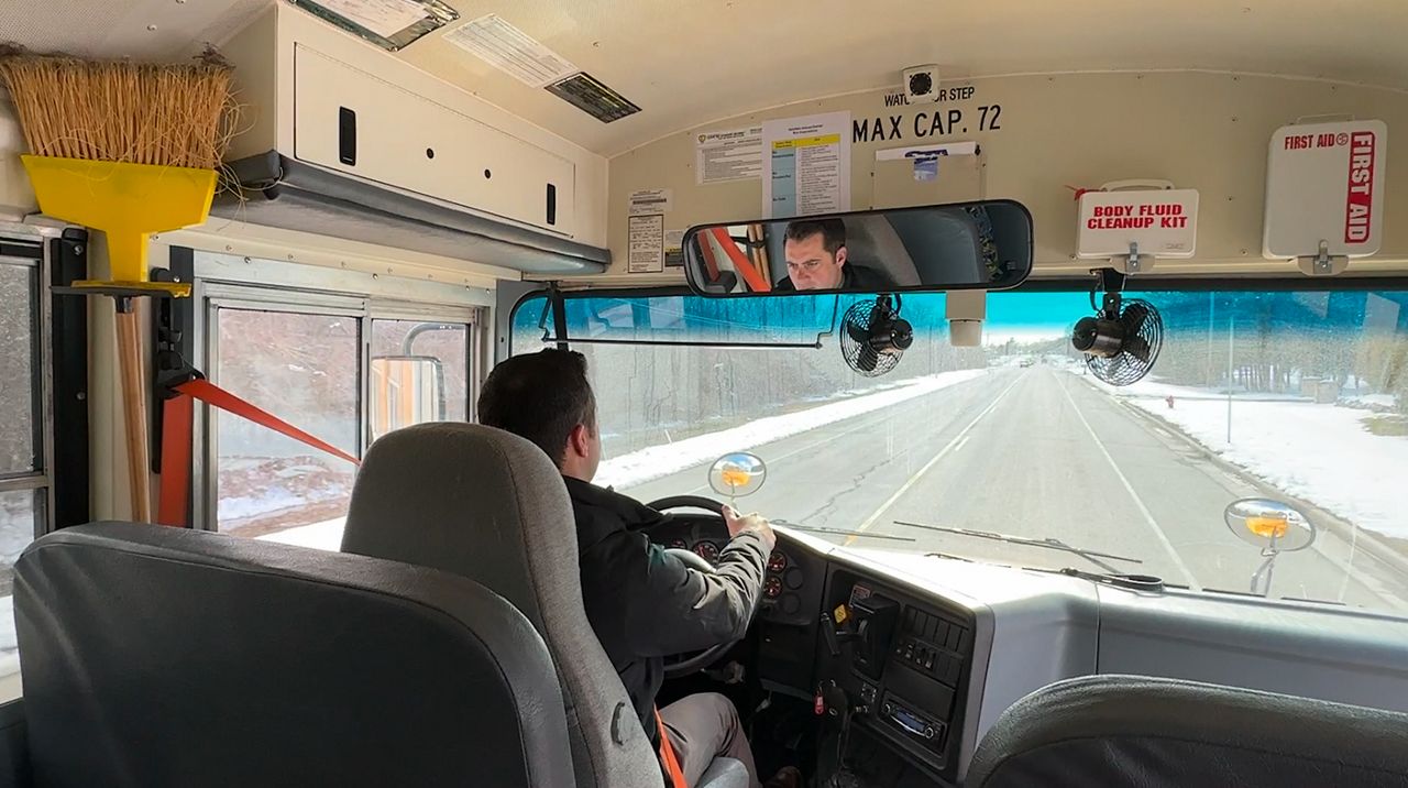 Double duty Principal drives students home