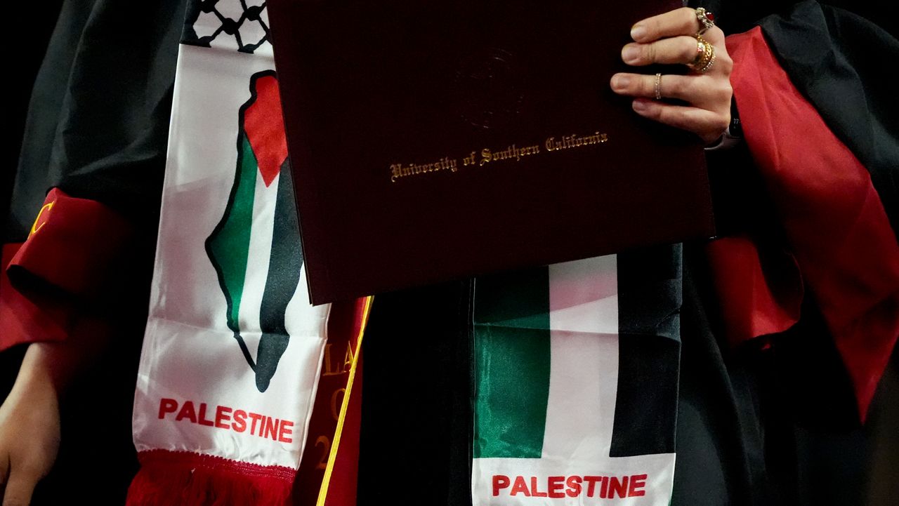 Palestinian insignia are seen on the stole of a graduate during commencement for the University of Southern California's Viterbi School of Engineering Friday, May 10, 2024, in Los Angeles. (AP Photo/Ryan Sun)