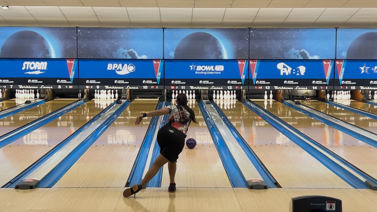Danielle McEwan, a professional bowler, bowling at Yorktown Lanes in Parma (Katie Priefer)