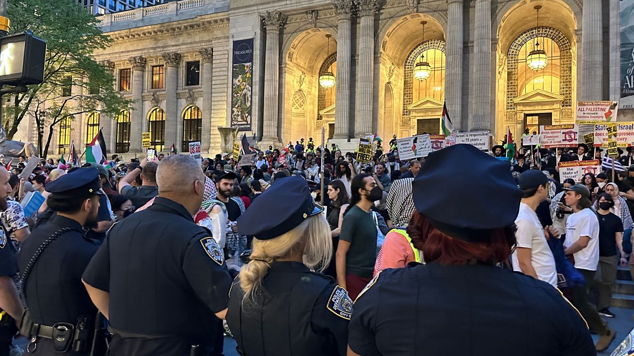 The protests began at Union Square, made their way to the New York Public Library and ultimately ended up outside the Fashion Institute of Technology. (Spectrum News NY1/Tyler Buesching)