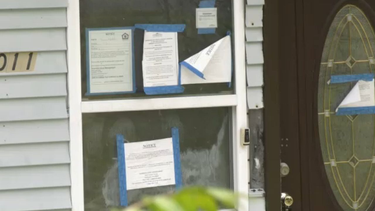 Mayors announce settlement in zombie properties case