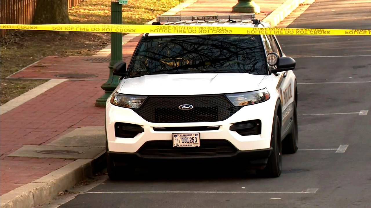 In this image taken from video, police are deployed outside the Israeli Embassy in Washington, Sunday, Feb. 25, 2024, after an active-duty member of the U.S. Air Force was critically injured after setting himself ablaze outside the diplomatic compound. (WJLA via AP)