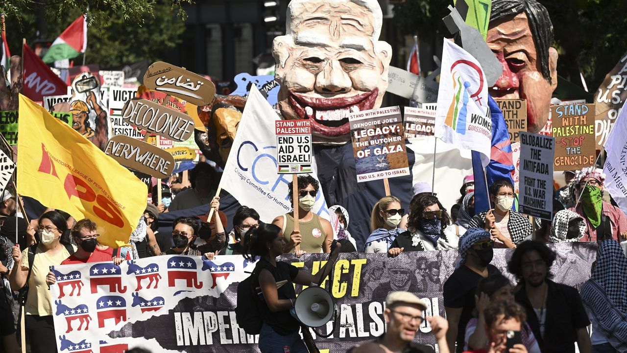 Protesters march to the Democratic National Convention after a rally at Union Park Monday, Aug. 19, 2024, in Chicago. (AP Photo/Noah Berger)