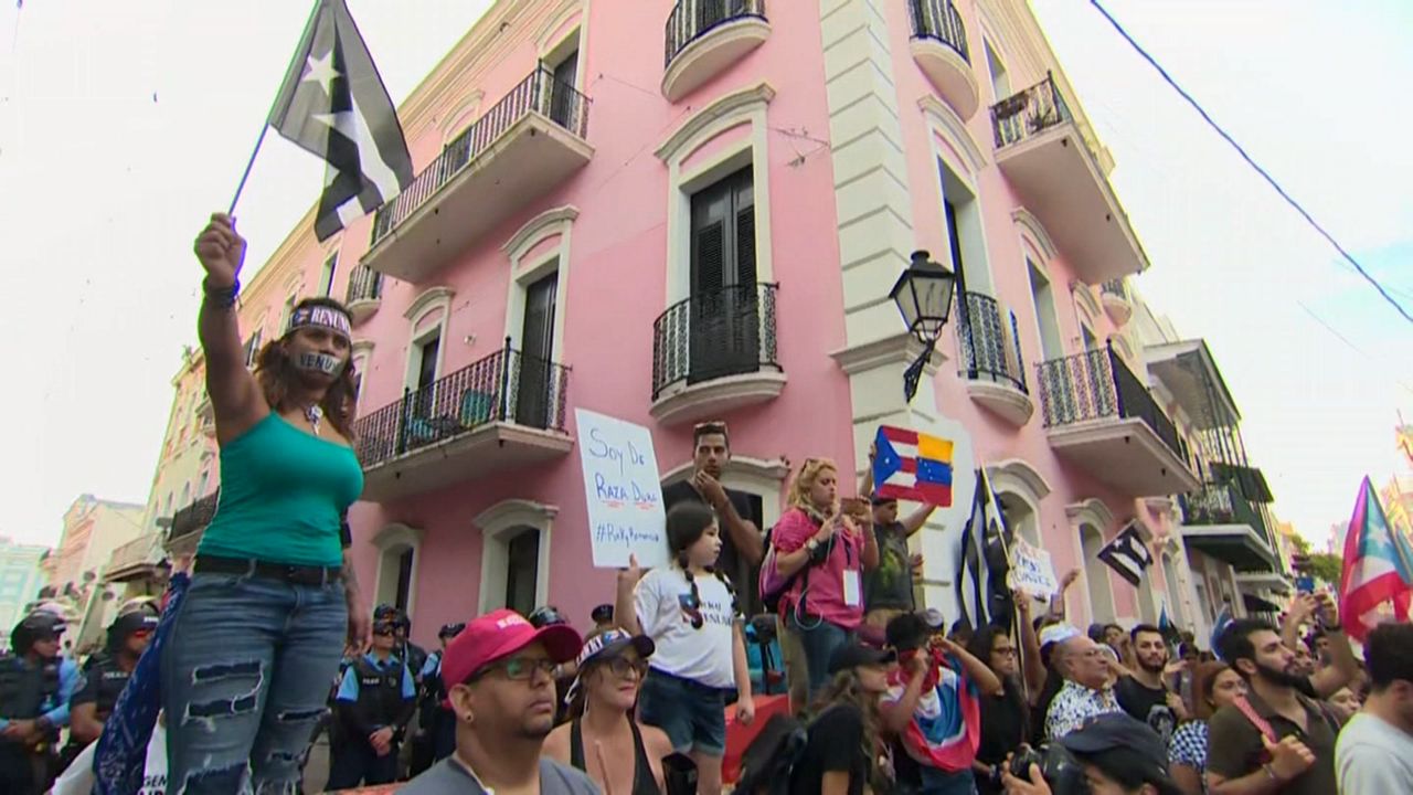 Puerto Ricans vowed to keep protesting until Puerto Rico's Gov. Ricardo Rosselló  steps down. (File photo of protesters.)
