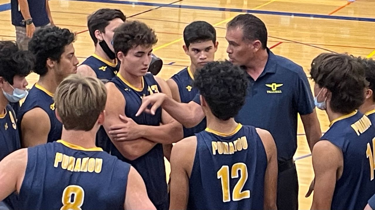 Coach Rick Tune spoke to his Punahou players at Kamehameha's Kekuhaupio Gym in a tough four-set win for the Buffanblu.