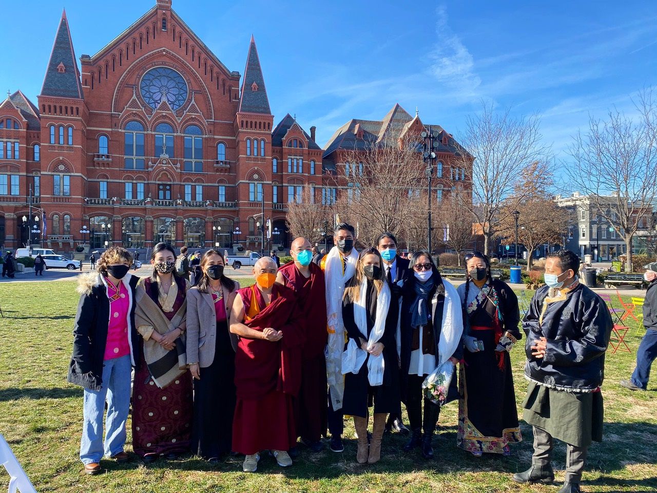 Aftab Pureval surrounded by family and a group from Tibet during his swearing-in ceremony at Washington Park in Cincinnati. (Casey Weldon/Spectrum News 1)