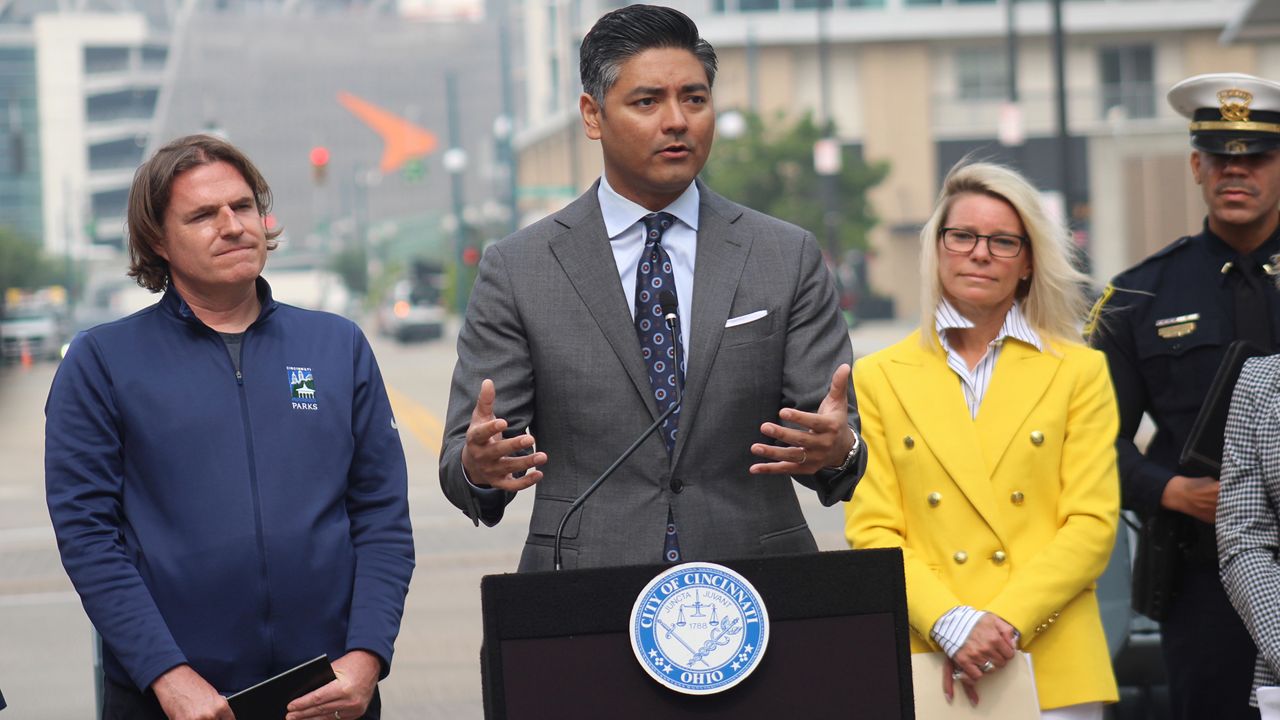 Mayor Aftab Pureval (center) discusses preparations the city has made in anticipation of the busy weekend. (Spectrum News 1/Casey Weldon)