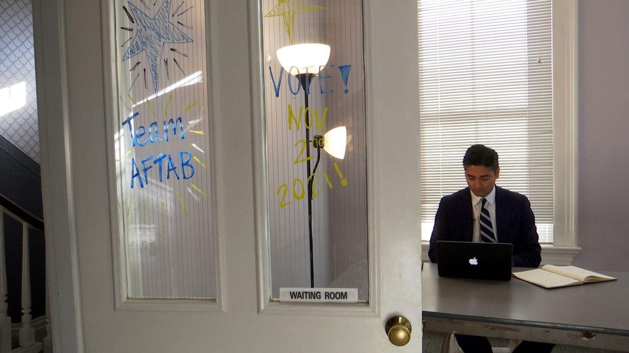 Aftab Pureval working in his campaign headquarters during the 2021 Cincinnati mayoral election. (Spectrum News 1)